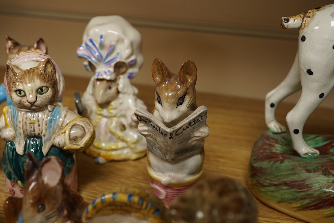 A collection of Beatrix Potter figures, three Staffordshire Dalmatians and a Copenhagen Dalmatian, tallest 16cm high